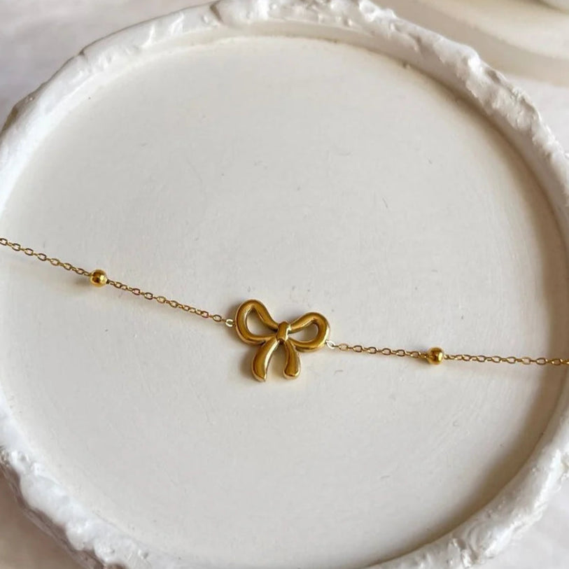 Charm knot bow gold bracelet