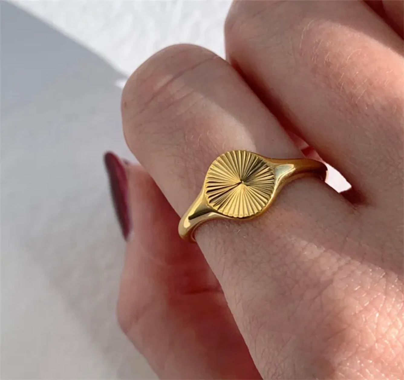 Positive gold plated ring