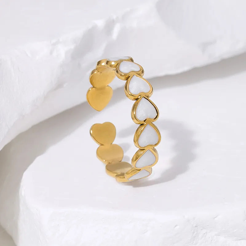 White resin gold plated heart ring