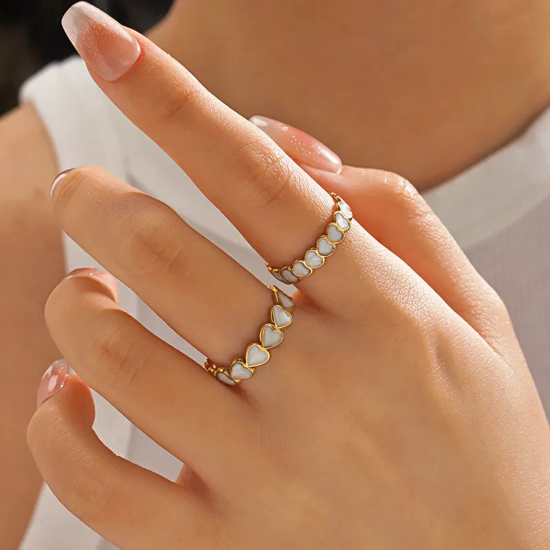 White resin gold plated heart ring