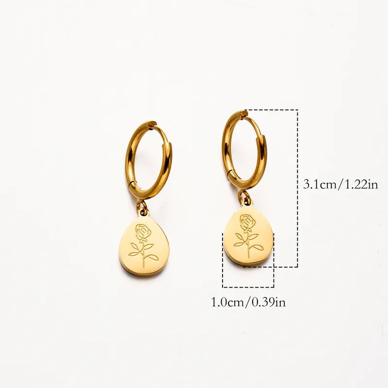 Golden rose charm huggies earings
