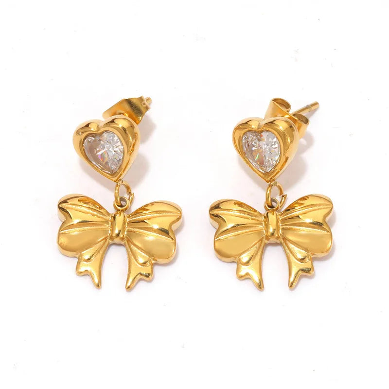 Bow drop heart zirconia gold studs