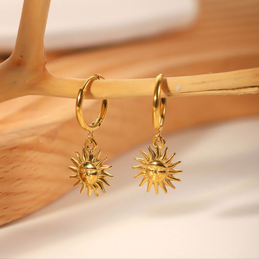 Dainty sun huggie earrings