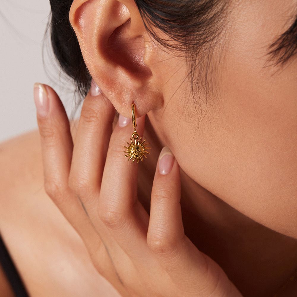 Dainty sun huggie earrings