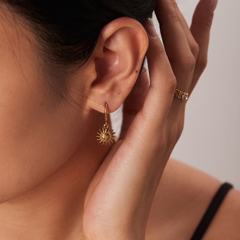 Dainty sun huggie earrings