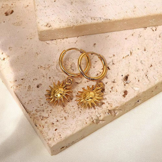 Dainty sun huggie earrings