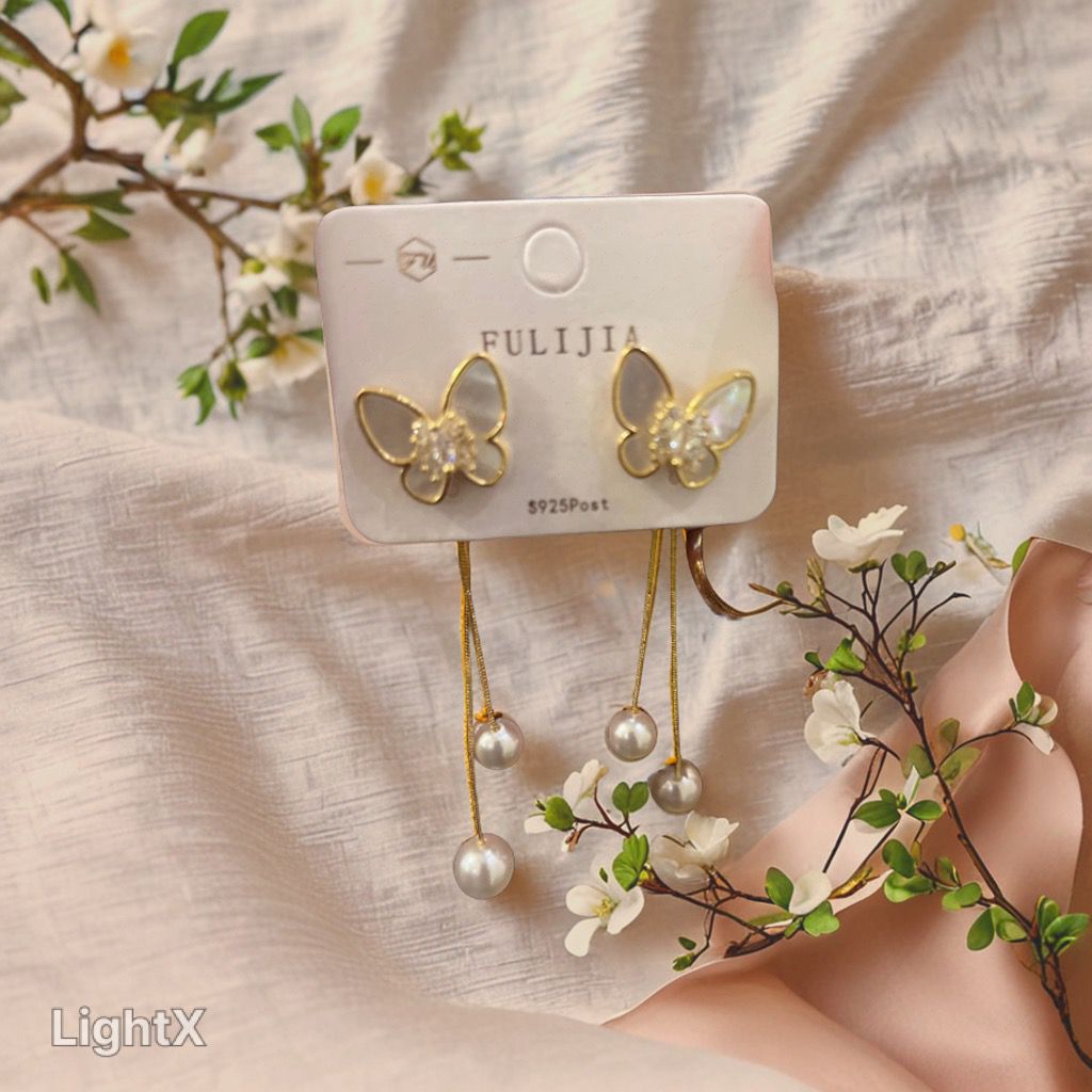 Butterfly long back tail earrings