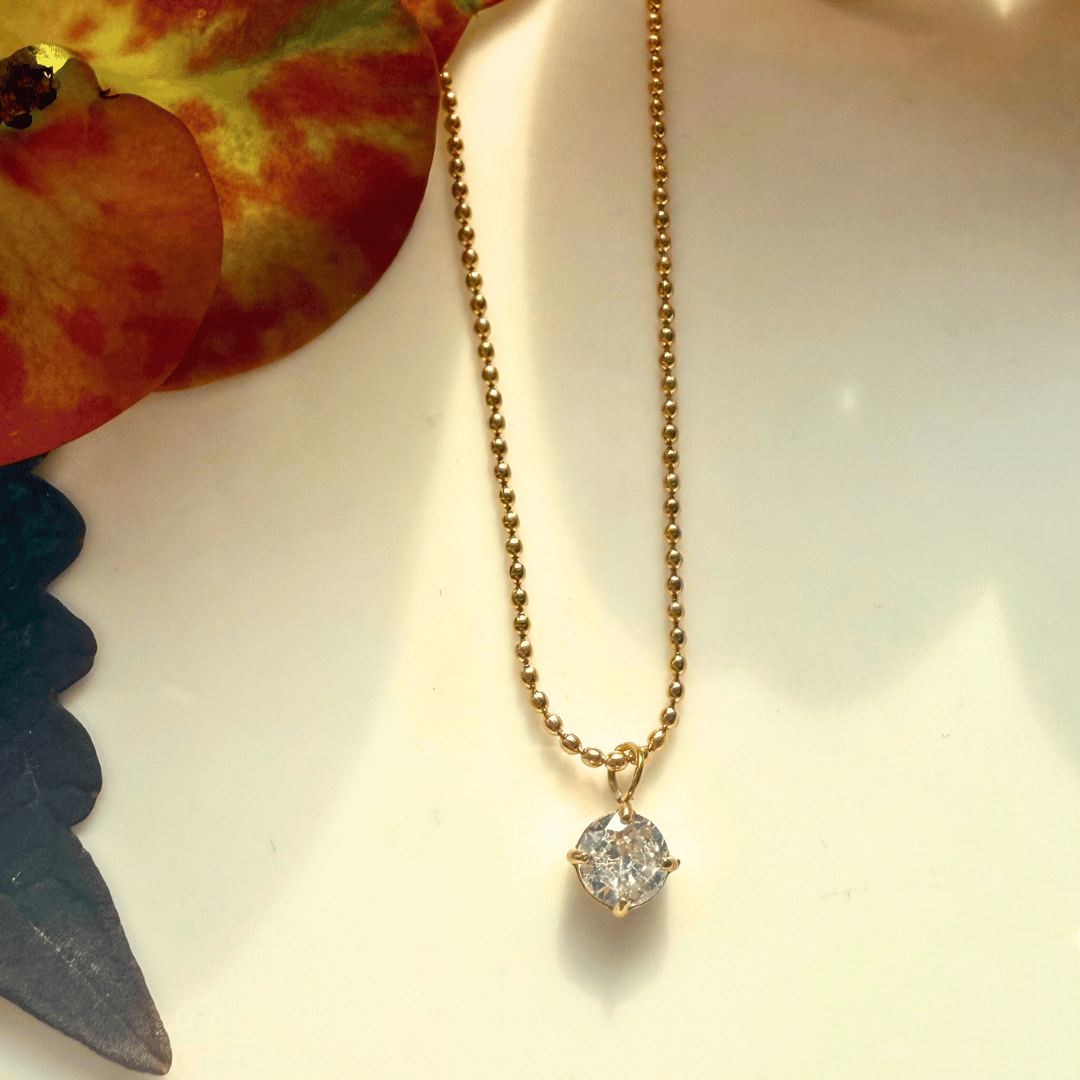 Premium White zircon in a beaded gold plated chain