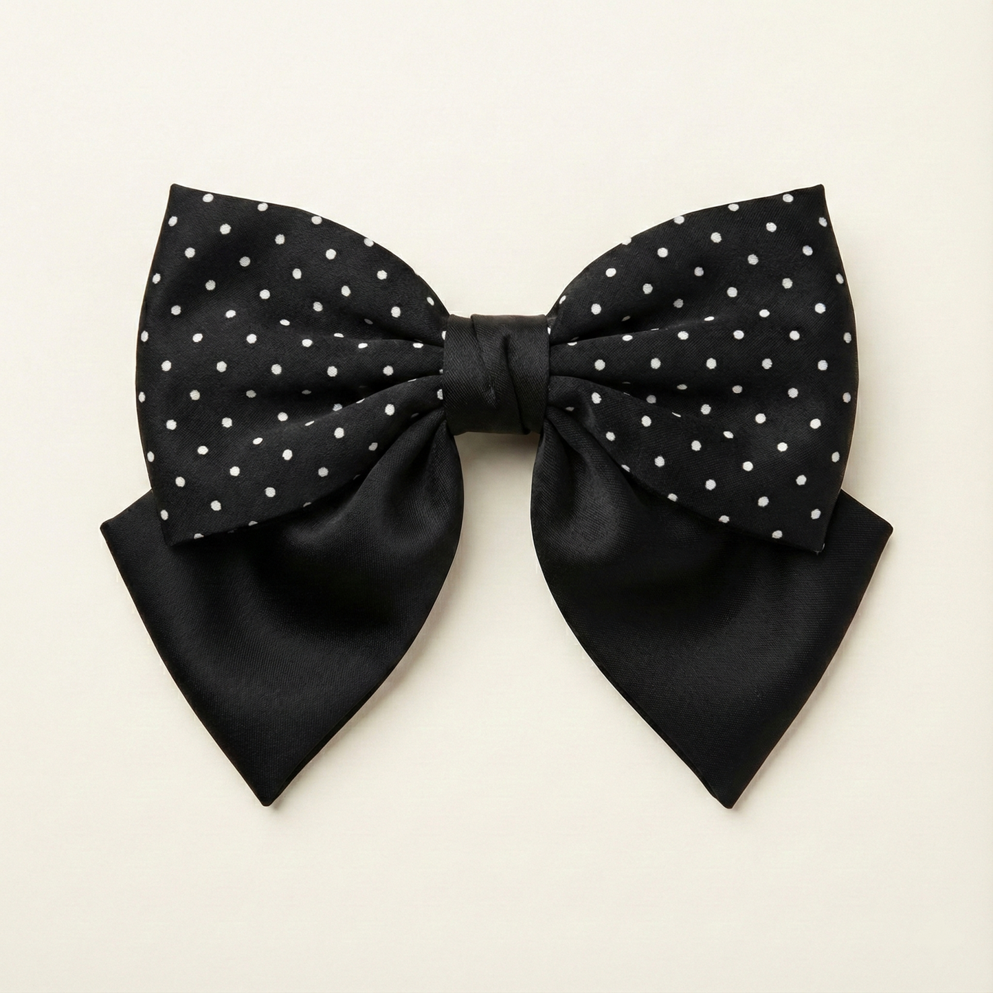 Black polka satin hair bow front view