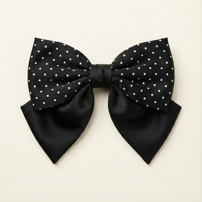 Black polka satin hair bow front view