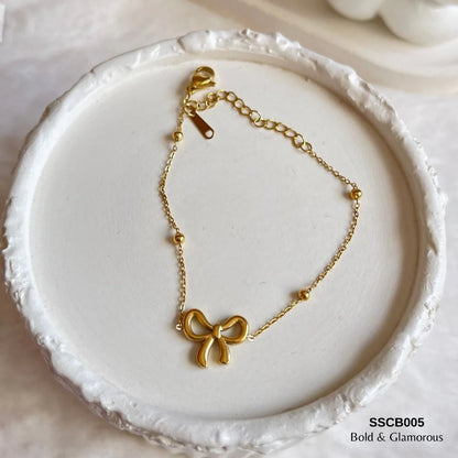 Charm knot bow gold bracelet