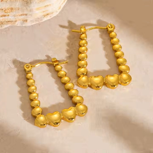 Luxury Beautiful Gold earings with heart details