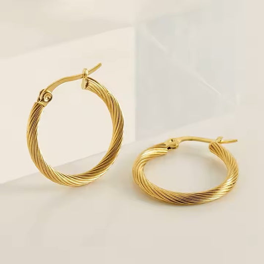 High-end Ondine Twisted twirl 18k gold plated pvd earings Myst juels