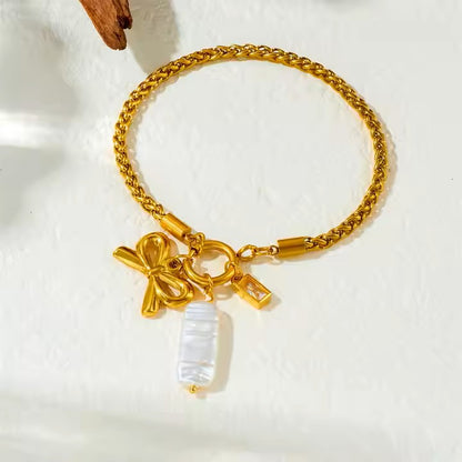 Luxurious bow charm link bracelet