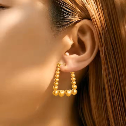 Luxury Beautiful Gold earings with heart details