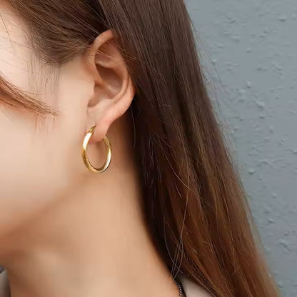 High-end Ondine Twisted twirl 18k gold plated pvd earings Myst juels
