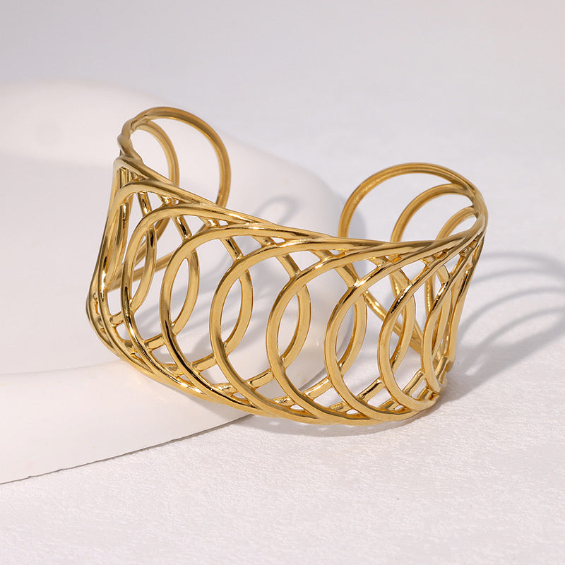 Open loop gold cuff bracelet