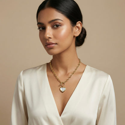 Gold heart toggle necklace on model