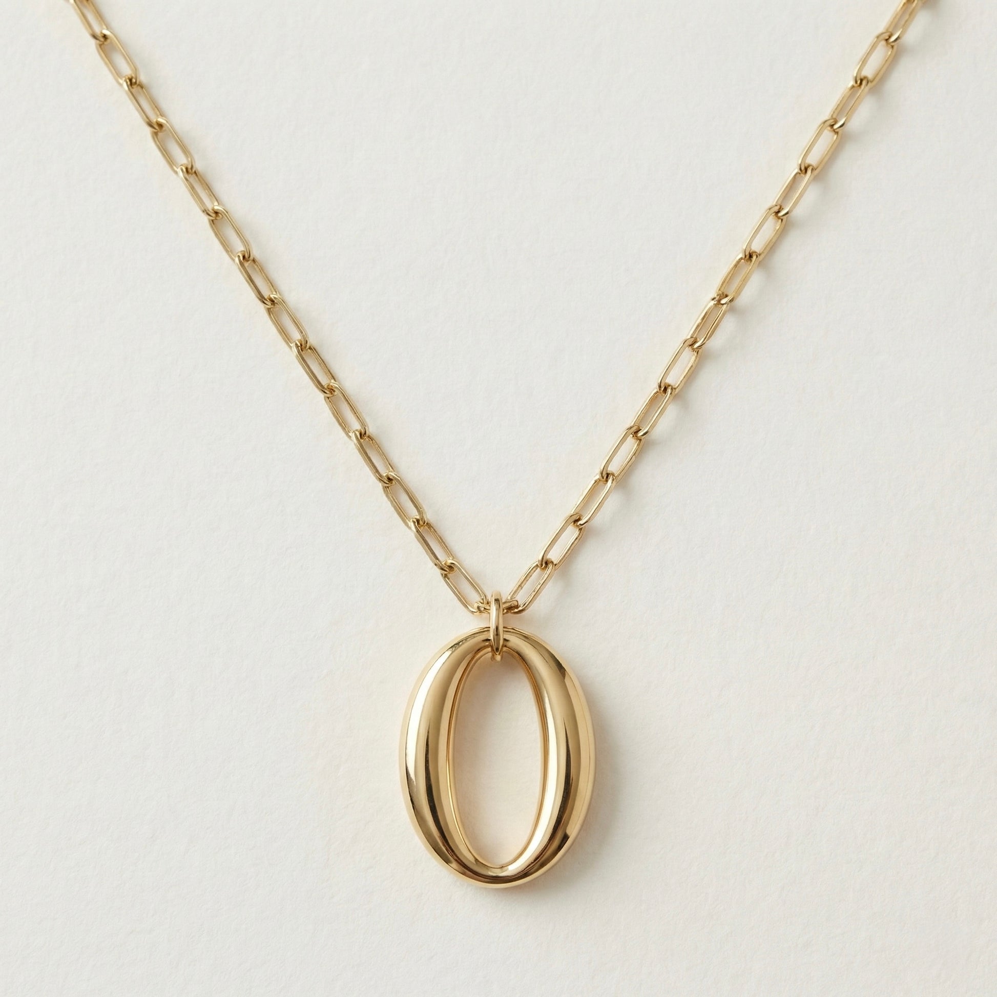 Gold oval link pendant necklace