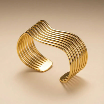 Golden Wave Modernist Set – Cuff Bracelet & Swirl Stud Earrings