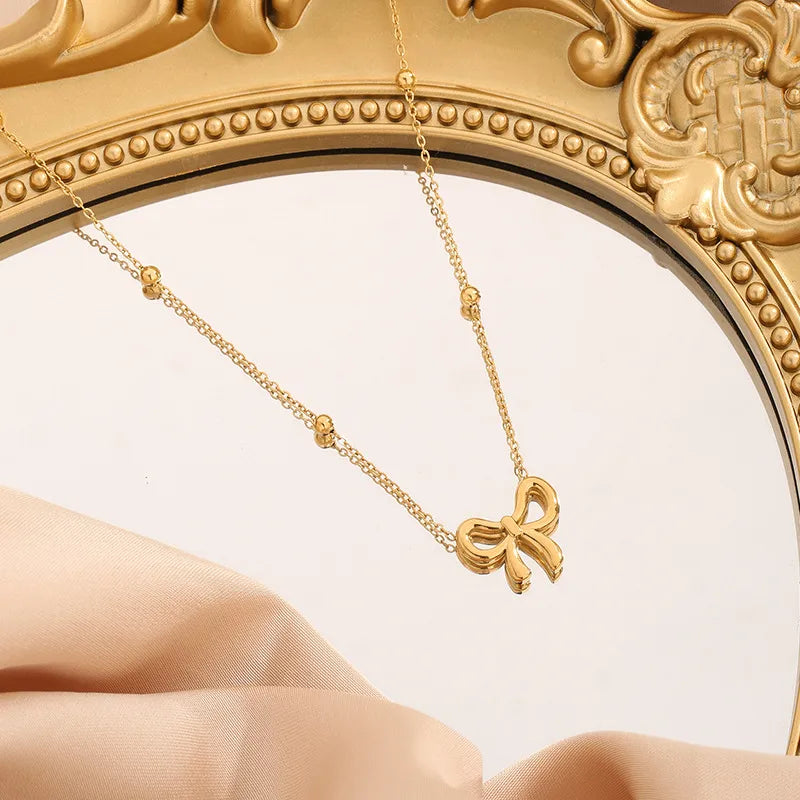 High-end bow stainless steel gold plated necklace