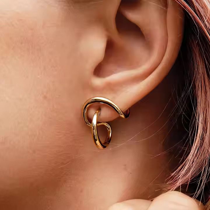 Ultra luxurious twist & drape earrings