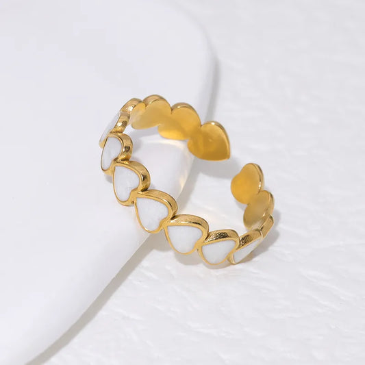 White resin gold plated heart ring