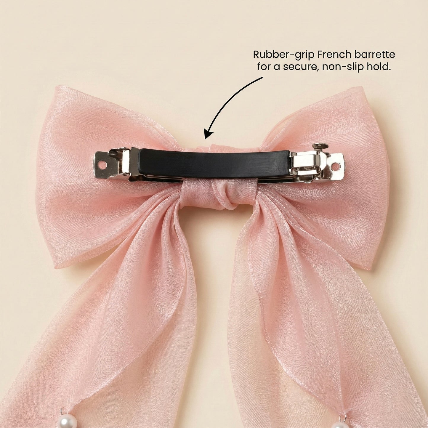 Back view of blush pink hair bow with non slip French barrette