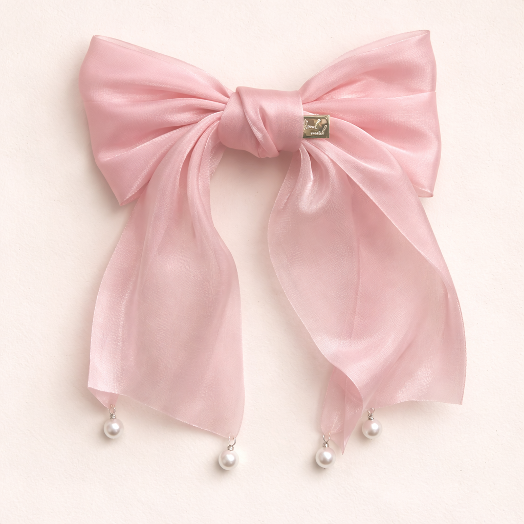 Blush pink organza hair bow with pearl ends