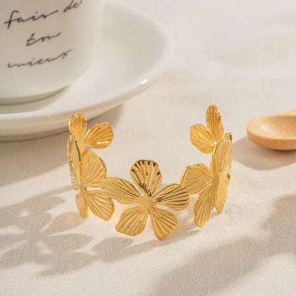 Luxurious golden flower cuff bracelet